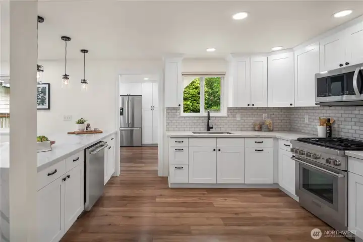 The kitchen extends into the pantry area straight ahead.