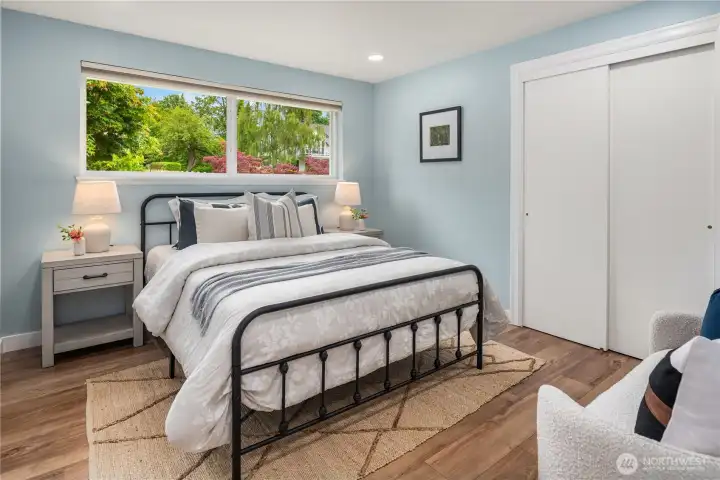 The second bedroom is spacious with a large closet.