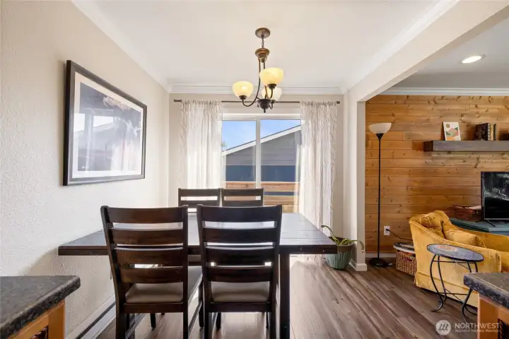 With a sliding glass door which leads to either the front or the back yards.
