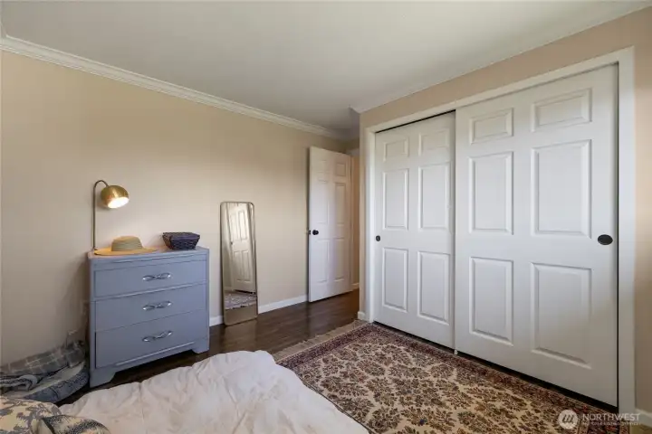 This tranquil second bedroom offers soothing eastern light.