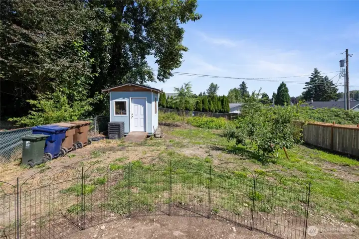 With a shared alley access beyond the property line.