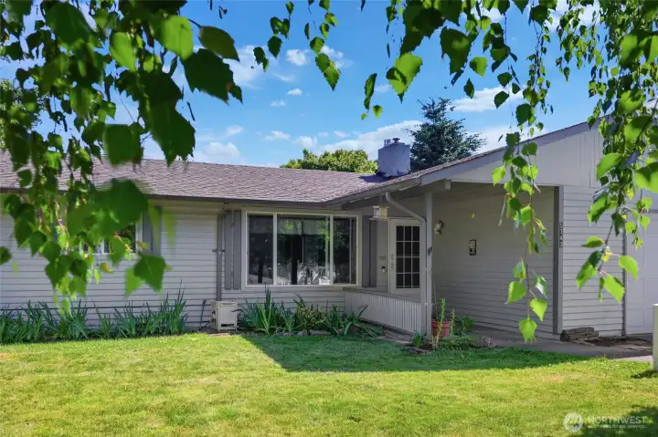 Beautiful front entrance-private feeling with tree lined street.