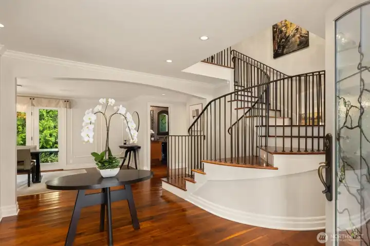 The hammered bronze stair railing is a custom piece crafted by Bainbridge Island sculptor Jeff Oen.