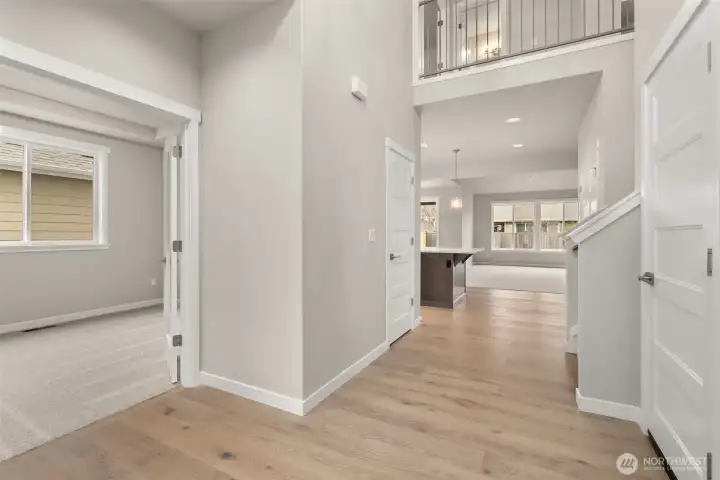 Looking from entry towards the living room. To the left is the 3rd bed/office. Looking from entry towards the living room. To the left is the 3rd bed/office.