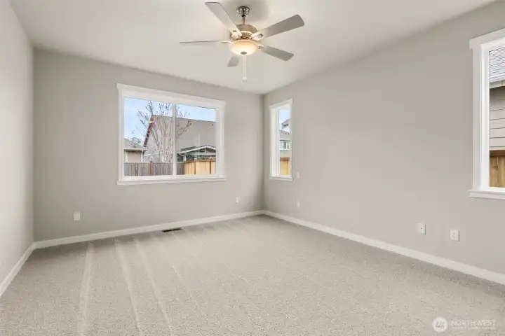 Primary bedroom features ceiling fan for added comfort Primary bedroom features ceiling fan for added comfort