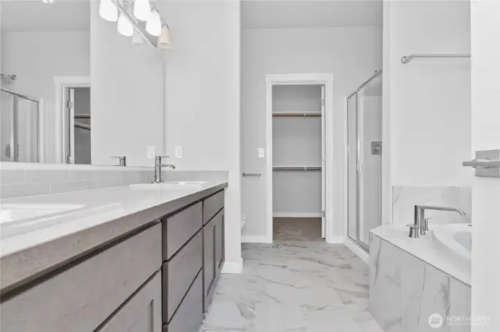 Beautiful 5 piece primary bath with tile in a soaking tub Beautiful 5 piece primary bath with tile in a soaking tub
