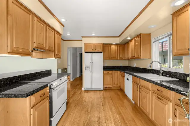 Updated appliances, hardwood floors & granite counter tops