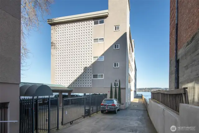 Secure parking through electronic gate. One designated parking space.