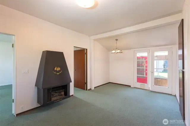 View of the electric Fireplace, Living Room and Dinining Room.