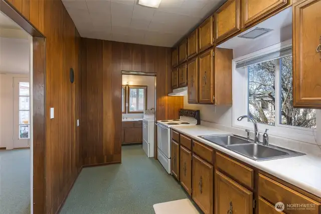 Kitchen looking into Laundry Room.