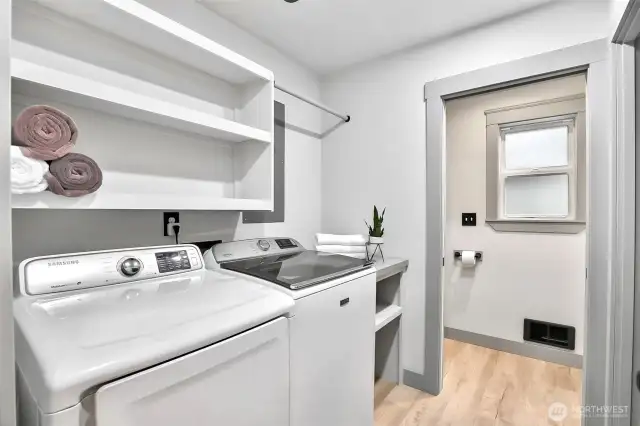 Laundry center with powder room in back.