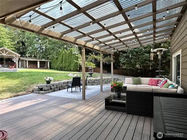 Covered lounge area just outside the kitchen.