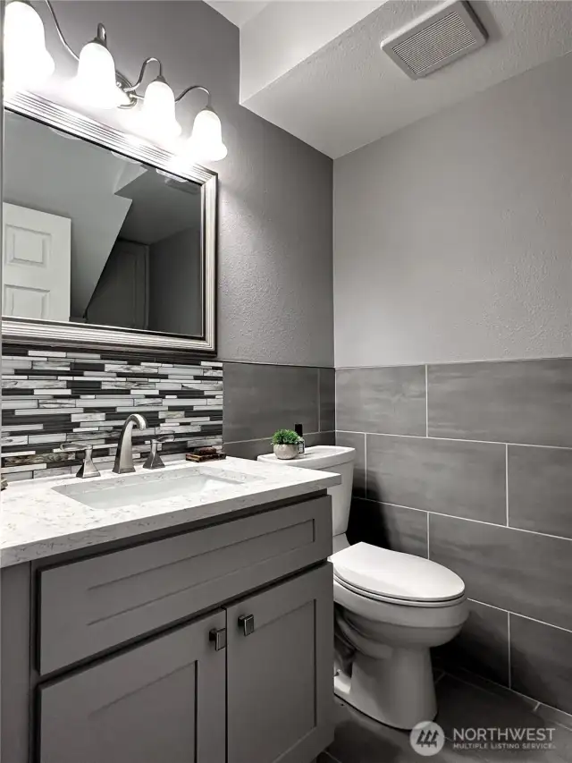 Lower level 1/2 bath and laundry.