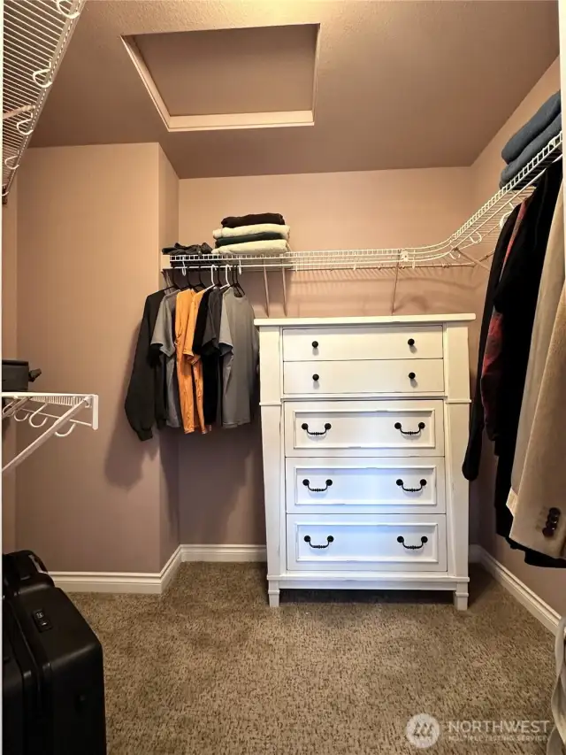 Primary walk in closet.
