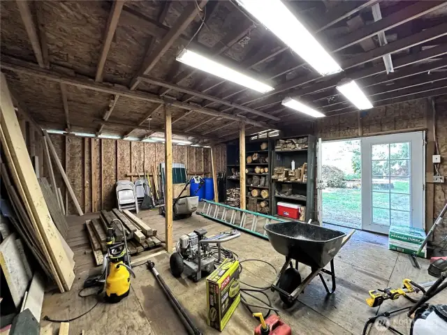 Large shop with double doors for easy access and great lighting.