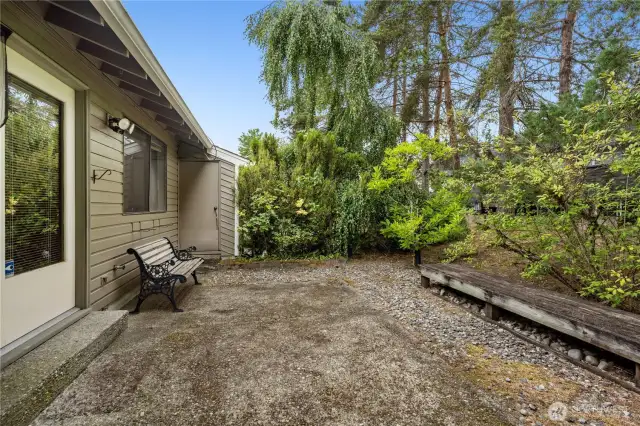 Private backyard patio off french doors in living room