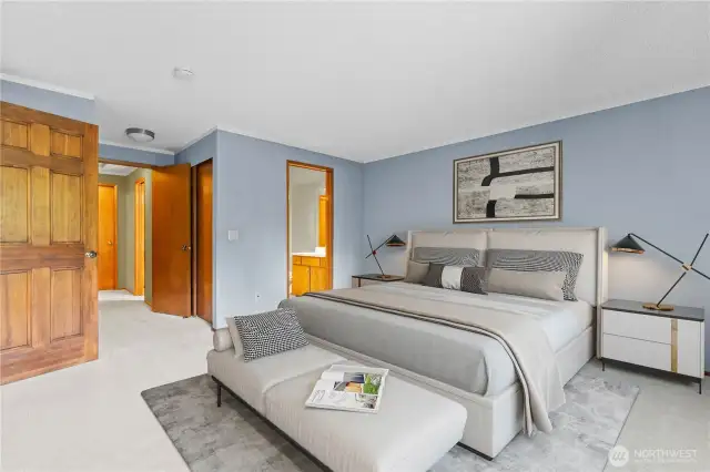 Large primary bedroom with en suite bathroom- virtually staged