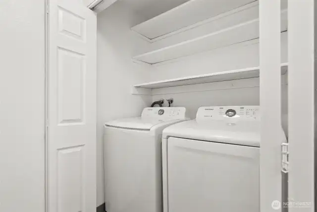 Laundry room downstairs washer and dryer stay