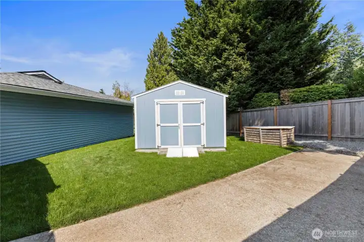 This Newer TUFF shed (March 2022) will stay with the home- as does the mower inside, so you can mow that beautiful new lawn! The pad is a great spot for RV or Boat parking-and its behnd the fence.