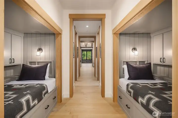 Independent  reading lights and charging stations in each bunks recessed bookshelf at headboard.