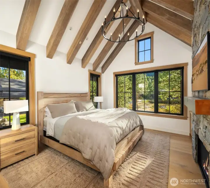 Vaulted ceilings with exposed beams in the Primary bedroom