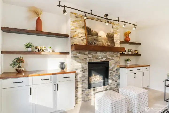 Great room featuring a cozy fireplace with custom built-ins, creating a warm focal point for gatherings.