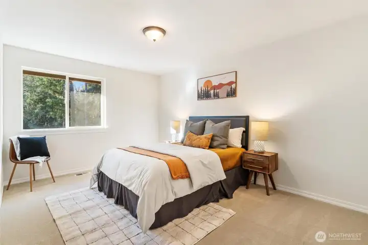 Guest bedroom offering privacy and versatility for home office or visitors.