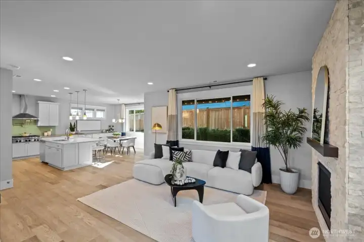 Step inside to open concept living - perfect for entertaining large parties or just enjoying a quiet evening at home.The 9ft ceilings, wood floors and gas fireplace bring warmth and charm to the space.