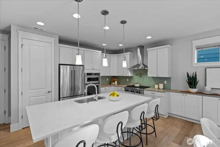 Enjoy the extra storage in the pantry plus extended lower cabinets along the dining area wall