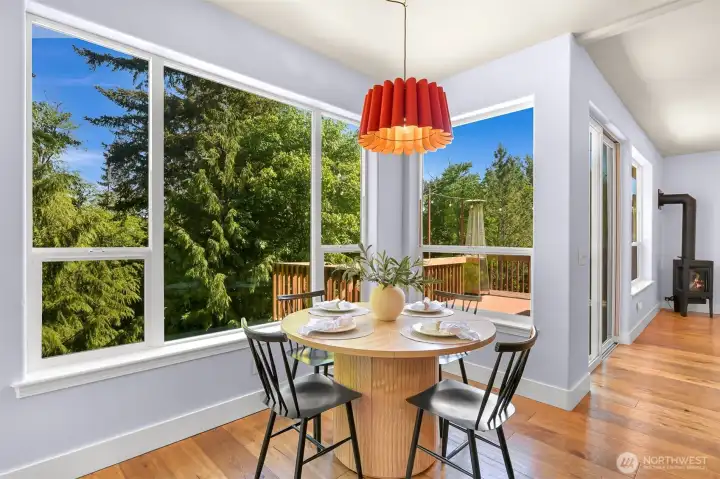 Enjoy your morning coffee under this designer light fixture while being surrounded by nature