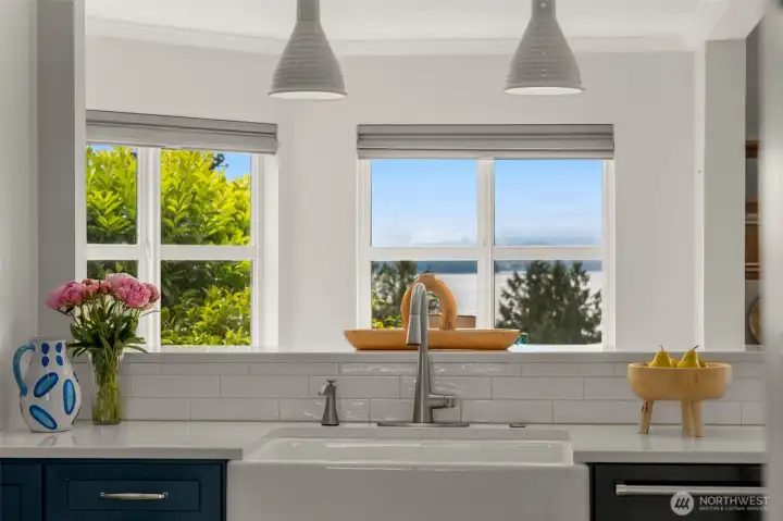 Surrounded by water views from the lovely oversized farmhouse sink Surrounded by water views from the lovely oversized farmhouse sink