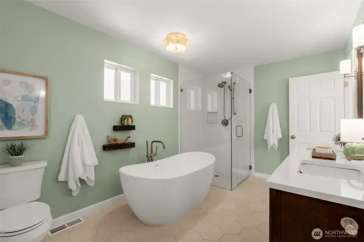 Completely remodeled primary bathroom. Gorgeous soaking tub, heated floors and stain resistant glass shower Completely remodeled primary bathroom. Gorgeous soaking tub, heated floors and stain resistant glass shower