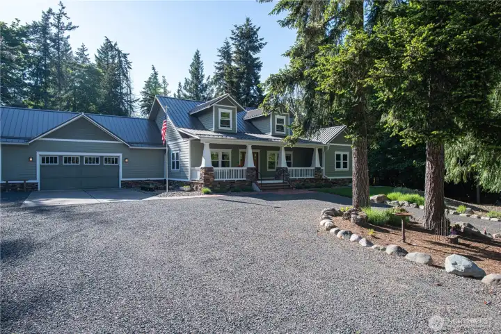 The attached garage is 800 sq ft with a half bath, plus a 576 sq ft workshop.