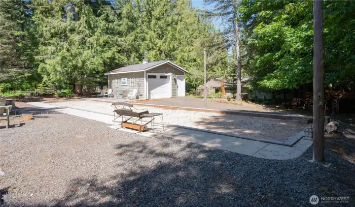 A 240 sq ft garden and storage shed adds exceptional versatility to the grounds.
