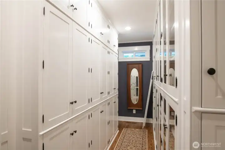 The spacious primary suite boasts custom built-ins.