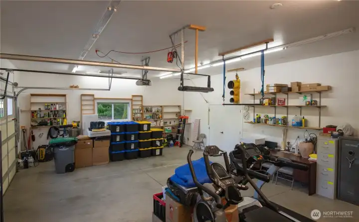 800 sq ft garage with a half bath, plus a 576 sq ft workshop.