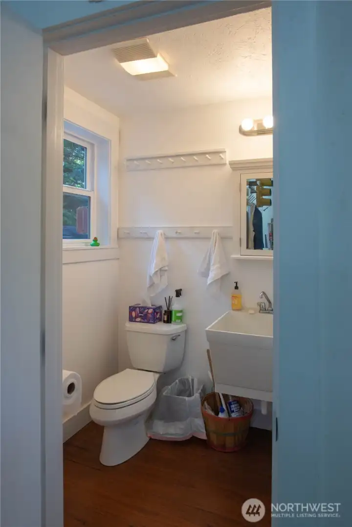Half bath off garage.