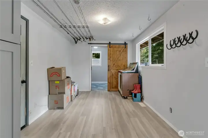 "Mud Room" area right off garage, also has back door to covered deck & back yard.
