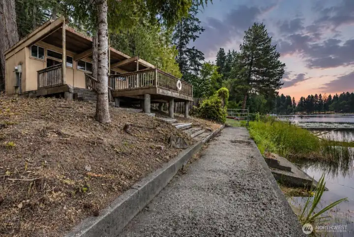 Western facing cabana, with all of the expensive concrete work done! Bulkhead, stairs to the water, and look at those pilings! Imagine your dream home here!