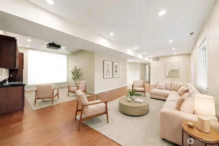 Virtually staged recreation room downstairs. Sliding door opens to patio and backyard.