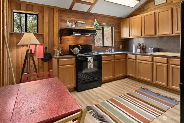 A large kitchen to enjoy creating wonderful meals. Tons of cabinet space.