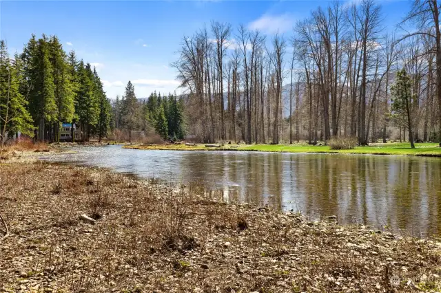 Enjoy your morning coffee sitting next to the river watching the fish jump.