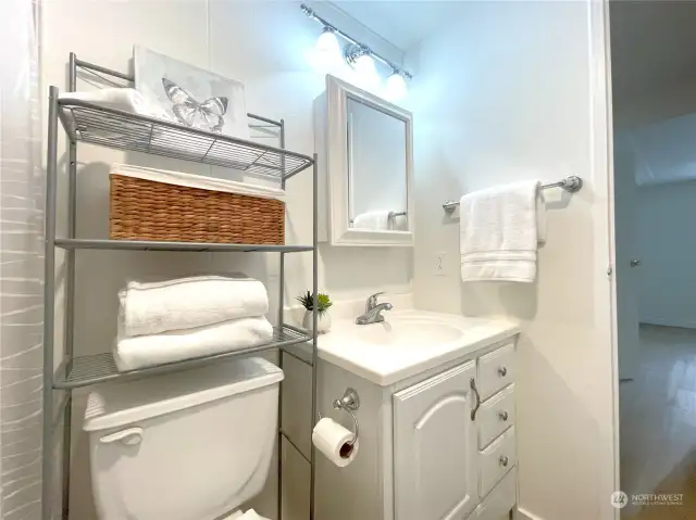 Convenient & Thoughtfully Designed – Located near the guest bedrooms, this bathroom offers easy access and features a handy medicine cabinet, providing extra storage for essentials while keeping everything within reach.