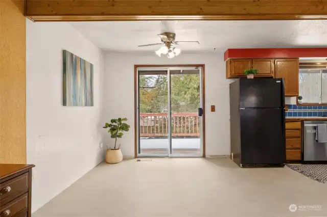 Dining Room Area Bridges Kitchen and Living Room, Slider to Entertainment Sized Deck!