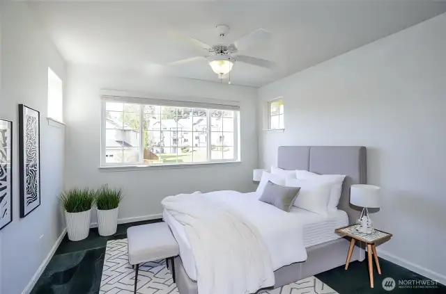 Spacious and sun-filled upper-level guest suite, designed for comfort and relaxation - virtually staged for inspiration.