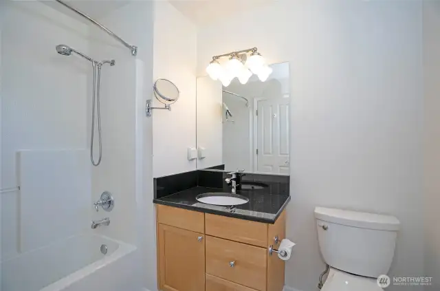 Beautifully designed upper-level guest bathroom, thoughtfully crafted for comfort and style.