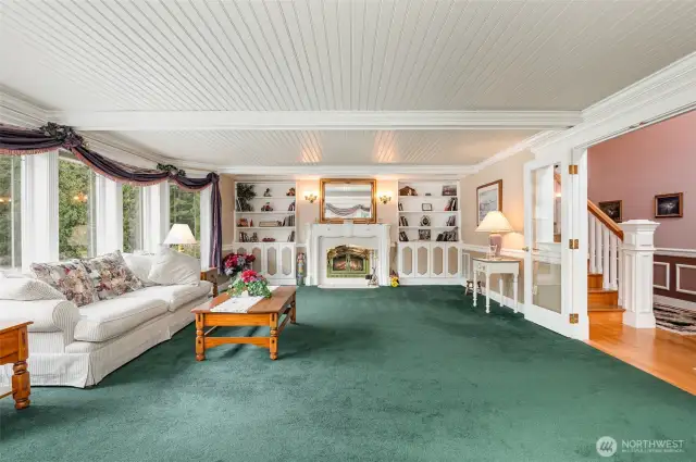 Built in bookcases & real wood fireplace in the formal living room