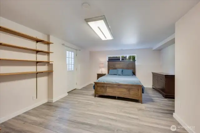 Large flex space currently being used as a bedroom.  Outside access to backyard.  Great potential for home gym or homeschool room.