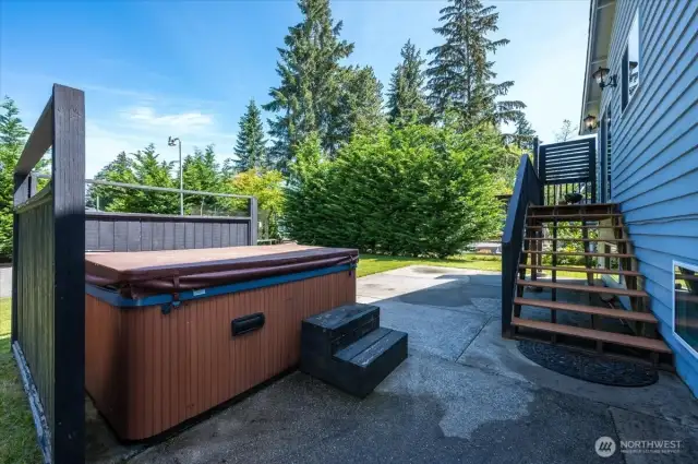 Hot tub with easy stair access to main level.