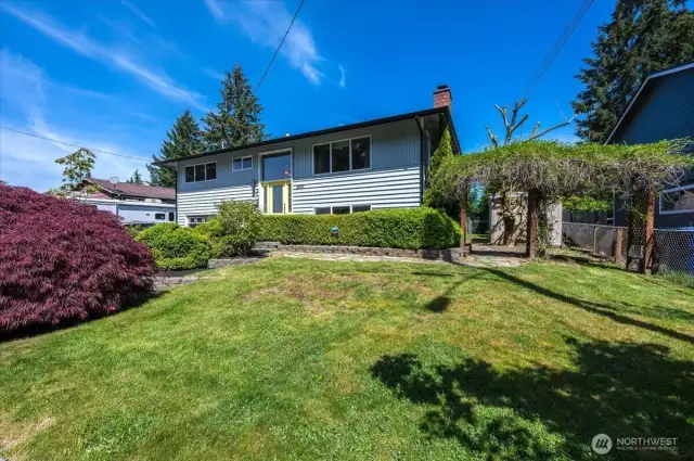 Backyard access from both sides of home.